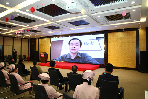 6北京市委宣傳部精神文明宣教處處長章力丁通過視頻發來祝賀.jpg